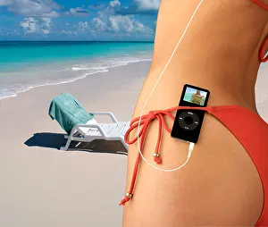 Bikini Prints: Woman with iPod nano tucked in red bikini waistband in tropical setting