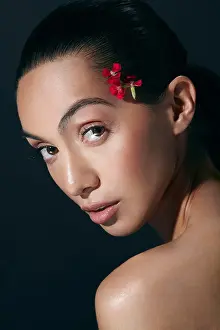 Eyebrow Prints: Woman looking over shoulder at camera