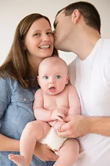 Kissing Prints: Woman and man holding baby boy (2-5 months)