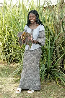 Aids Prints: Woman modelling a self-made dress, Bafut, Cameroun, Africa