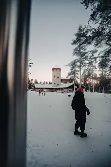 Boreal Prints: Woman outside entrance to wildlife park in Ranua, Lapland