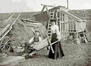 Shed Prints: A woman pushing a man in a wheelbarrow