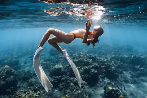 Glides Prints: Woman with sexy body swimming in tropical blue sea. Snorkeling with sexy girl