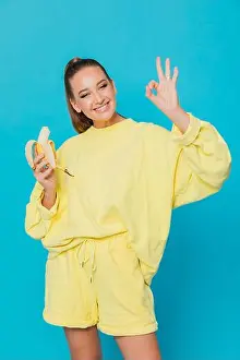Centimeter Prints: woman shows ok woman likes to eat banana