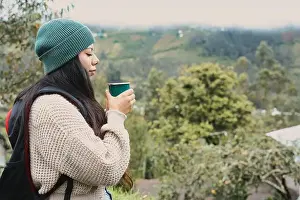Breathe Prints: A woman sips her warm coffee outdoors