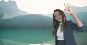 Well Dressed Prints: woman smiling with ok sign in the mountains