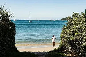 Day Light Prints: Woman standing on Jurere Beach. Florianopolis, Santa Catarina, Brazil