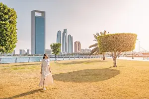 Emirate Prints: woman stands in the park in Abu Dhabi