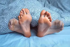 Restless Prints: Woman suffering from foot cramps