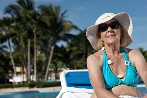 Unwind Prints: Woman Sunbathing by Pool, Cayo Coco, Cuba