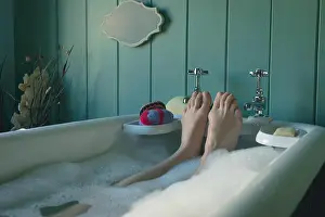 Homey Prints: Woman taking bath in bathtub at bathroom