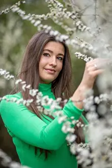 Serene Scene Prints: Woman wearing a green top and white pants