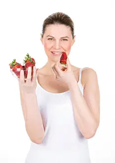 Vest Prints: woman with white dress holding some strawberries