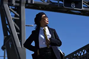 Headwear Prints: Woman in a white shirt & blue blazer