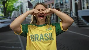 Melancholy Prints: Woman in yellow jersey rubs fists against her eyes on street; sadness disappointment longing reflection