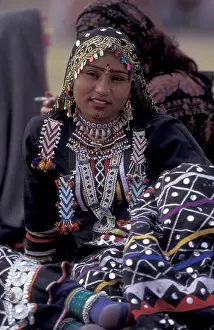 Rajasthani Prints: Women in traditional Rajasthani dress at the Bikaner Camel Festival in the Town of Bikaner in the Province of Rajasthan