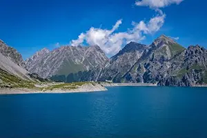 Wonderful landscape at the Luenersee with dam wall and rocks in Vorarlberg, Austria