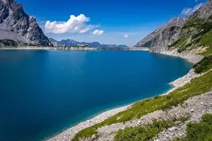 Wonderful landscape at the Luenersee with dam wall and rocks in Vorarlberg, Austria