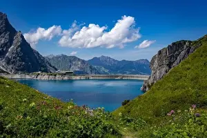 Wonderful landscape at the Luenersee with dam wall and rocks in Vorarlberg, Austria