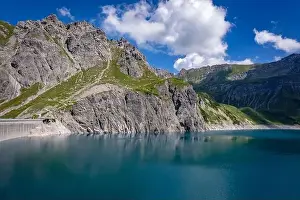 Cable Car Prints: Wonderful landscape at the Luenersee with dam wall and rocks in Vorarlberg, Austria