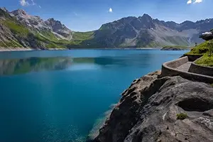 Cable Car Prints: Wonderful landscape at the Luenersee with dam wall and rocks in Vorarlberg, Austria