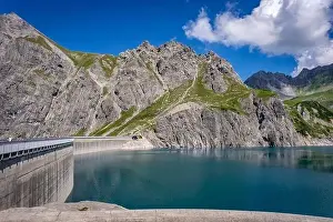 Cable Car Prints: Wonderful landscape at the Luenersee with dam wall and rocks in Vorarlberg, Austria