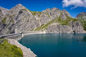 Cable Car Prints: Wonderful landscape at the Luenersee with dam wall and rocks in Vorarlberg, Austria