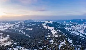 Wonderful landscapes of the Carpathian mountains covered with the first snow in Ukraine near the village of Pylypets