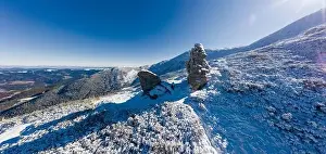 Wonderful landscapes covered with the first snow with large rocky ledges of the Carpathian Mountains