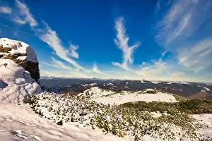 Carpathians Prints: Wonderful landscapes covered with the first snow with large rocky ledges of the Carpathian Mountains