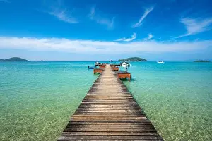 Wooden boat pier in sea and hut with clear day sky in Koh Mak at Trat, Thailand. Summer, Travel, Vacation and Holiday. Relax and traveling at sea conc