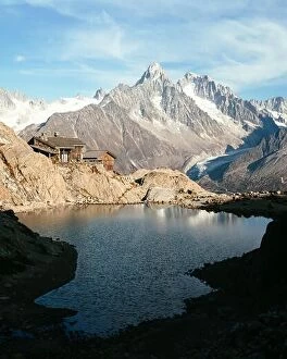 Images Dated 16th October 2018: Wooden cabin on Lac Blanc lake coast in France Alps. Monte Bianco mountain range on background