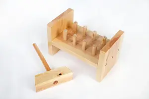 Having Fun Prints: A wooden child's hammer and peg toy