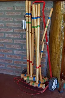 Cricket Prints: wooden croquet set with clubs. Summer retro games on vacation in Argentina. Vertical