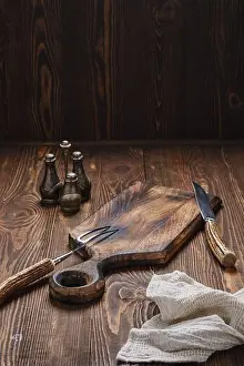 Cutting Board Prints: Empty wooden cutting board, fork and knife with for steak