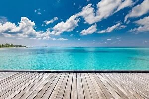 Images Dated 16th December 2018: Wooden floor with blue sea and sky background. Summer scenery with horizon