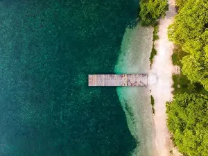Wooden Pier on Alpine asna Lake in Kranjska Gora Slovenia