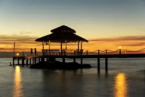 Wooden pier between sunset in Phuket, Thailand. Summer, Travel, Vacation and Holiday concept