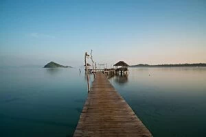 Images Dated 11th December 2017: Wooden pier between sunset in Phuket, Thailand. Summer, Travel, Vacation and Holiday concept