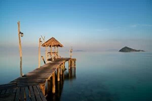 Images Dated 11th December 2017: Wooden pier between sunset in Phuket, Thailand. Summer, Travel, Vacation and Holiday concept
