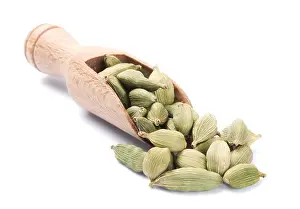 Pods Prints: Wooden shovel with cardamom pods scattered from it