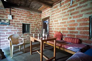 Insides Prints: Wooden table, plastic chair, rural village house ; Maharashtra ; India ; Asia