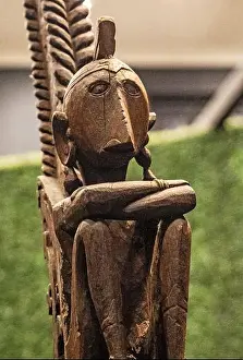 Cultural Representation Prints: Wooden tribal sculpture with intricate carvings
