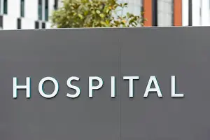 Australia Australian Prints: The word Hospital written in white capital letters on a grey background