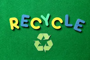 Litter Prints: Word RECYCLE and symbol on color background