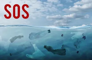 Dump Prints: Word SOS and plastic garbage in ocean. Marine pollution