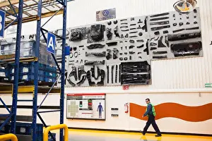 Magna Prints: A worker at the Magna plant in Puebla