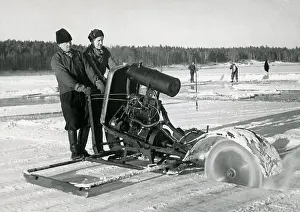 Nostalgical Prints: Workers collecting ice. Two men are sawing blocks of ice to use in homes to keep groceries cool