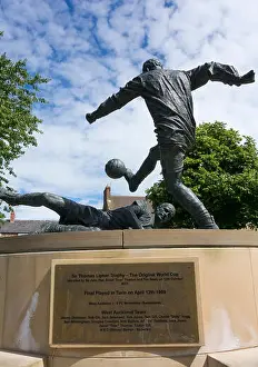 County Durham Prints: World Cup statue on village green in West Auckland
