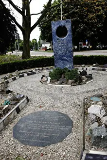 Inaugural Prints: the world peace flame memorial monument inscription outside the peace palace in The Hague in the netherlands
